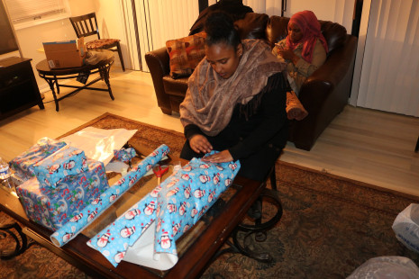 Volunteers wrapping gifts