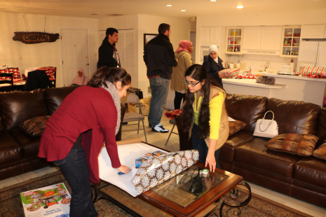 Volunteers wrapping gifts