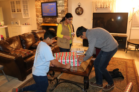 Volunteers wrapping gifts