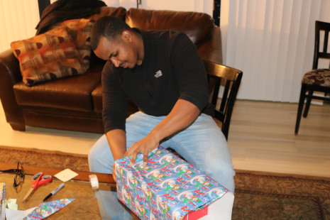 Volunteers wrapping gifts