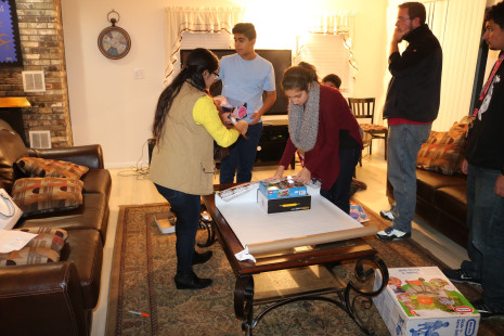 Volunteers wrapping gifts