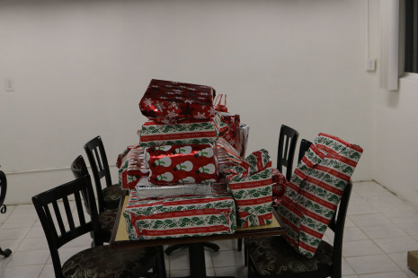 Volunteers wrapping gifts