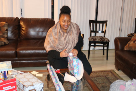 Volunteers wrapping gifts