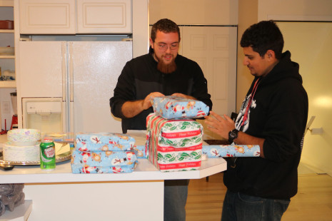 Volunteers wrapping gifts