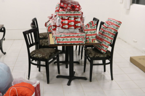 Volunteers wrapping gifts