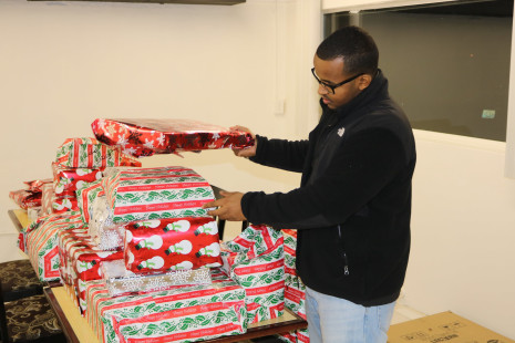 Volunteers wrapping gifts