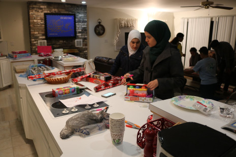 Volunteers wrapping gifts