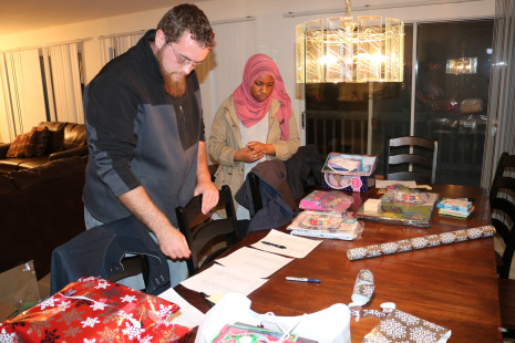 Volunteers wrapping gifts