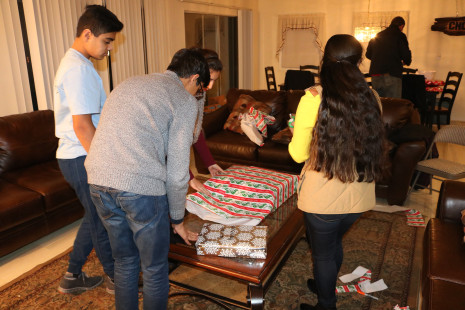 Volunteers wrapping gifts