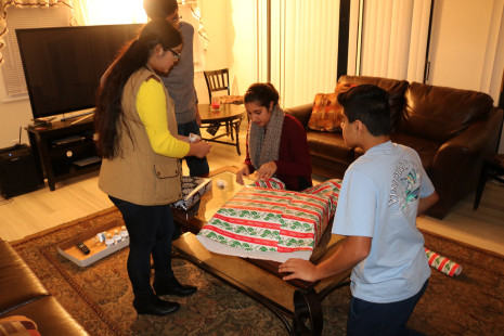 Volunteers wrapping gifts